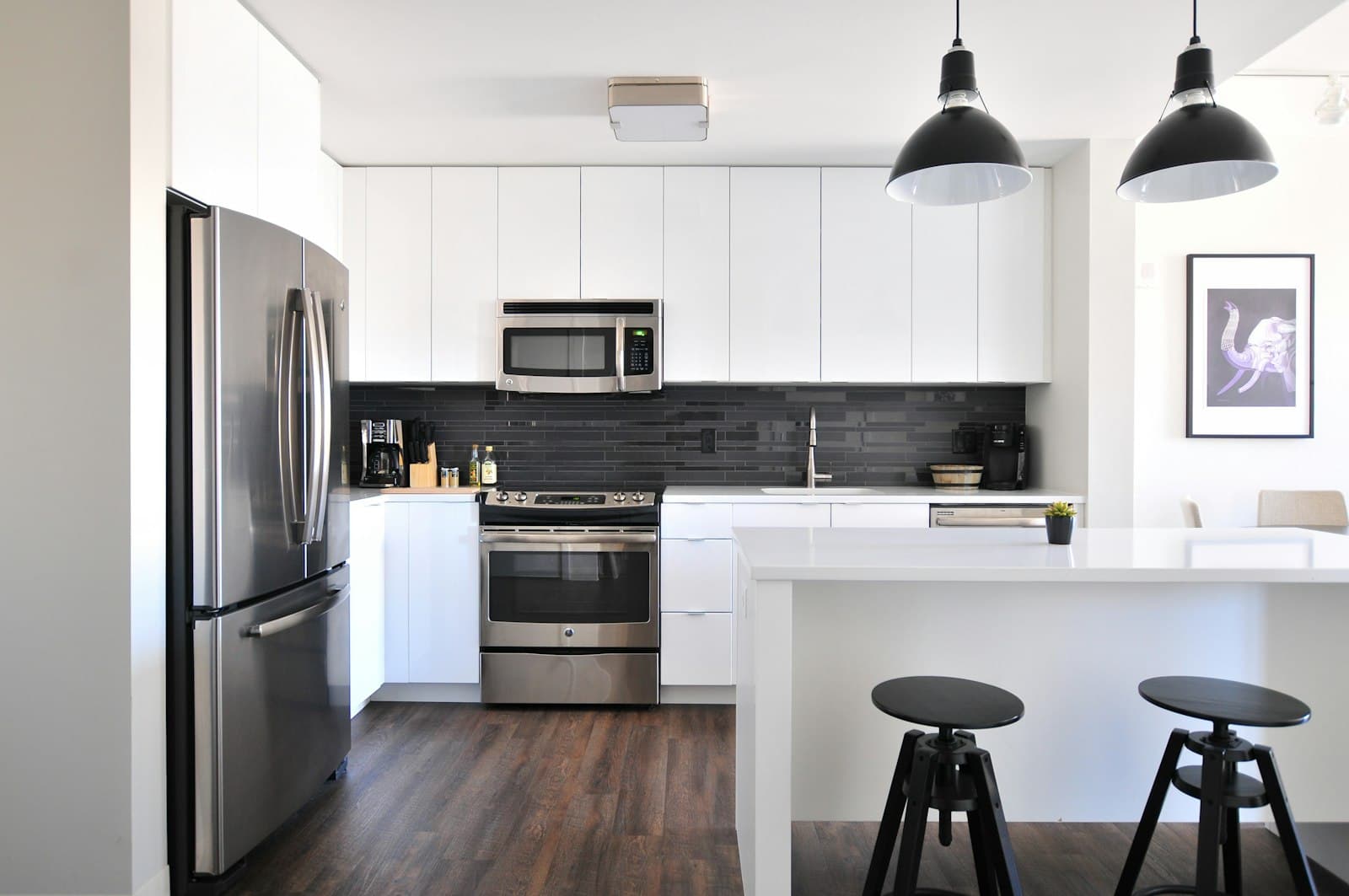 Kitchen being remodeled, with open shelving and a wood counter